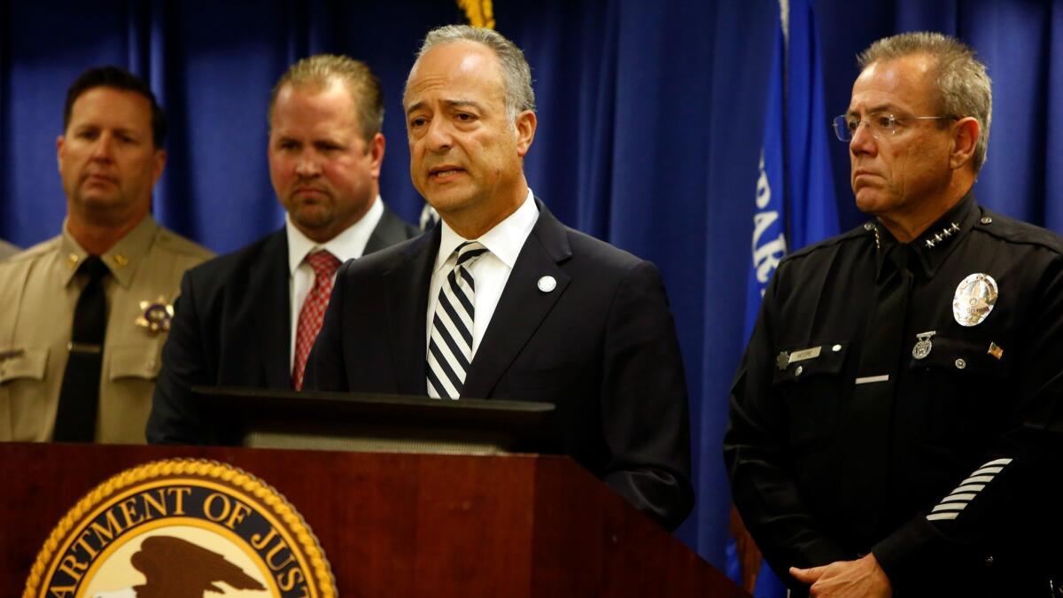 United States Attorney Nicola T. Hanna speaks during a press conference to discuss the arrest of Mark Steven Domingo who allegedly plotted terror attacks targeting southland sites at the Federal Building on April 29, 2019, in Los Angeles, California.