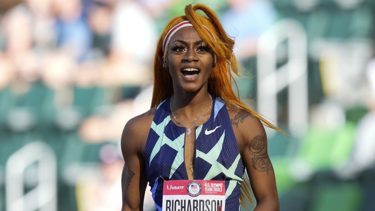 In this June 19, 2021 photo, Sha'Carri Richardson celebrates after winning the first heat of the semis finals in women's 100-meter runat the U.S. Olympic Track and Field Trials in Eugene, Ore. Richardson cannot run in the Olympic 100-meter race after testing positive for a chemical found in marijuana. Richardson, who won the 100 at Olympic trials in 10.86 seconds on June 19, told of her ban Friday, July 2 on the “Today Show.”(AP Photo/Ashley Landis)
