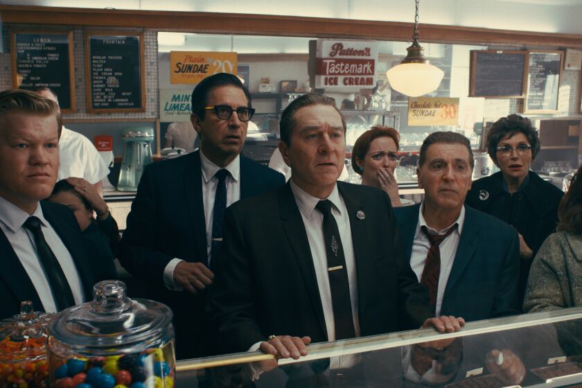 (L-R) Jesse Plemons, Ray Romano, Robert De Niro, and Al Pacino in "The Irishman" movie on Netflix.