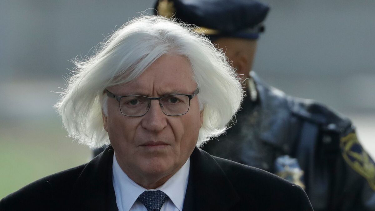 Tom Mesereau, Bill Cosby's attorney, arrives at court Tuesday.