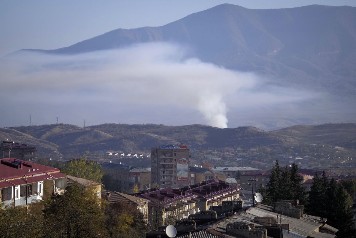 Smoke rises over Stepanakert, the capital of Nagorno-Karabakh, after shelling by Azerbaijan's artillery.