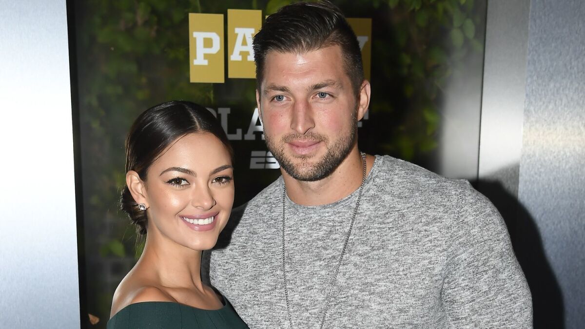 Tim Tebow and Demi-Leigh Nel-Peters attend a San Jose party on Jan. 5.