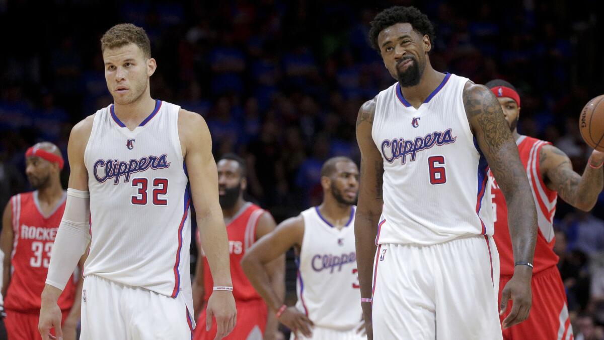 Clippers forward Blake Griffin, left, and center DeAndre Jordan look on during a 119-107 loss to the Houston Rockets in Game 6 of the Western Conference semifinals at Staples Center on May 14, 2015.