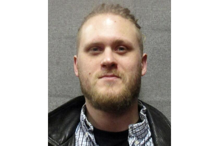 This March 2024 photo provided by the Wisconsin Department of Corrections shows Maxwell Anderson, who was charged Friday, April 12, 2024, in the slaying of a woman whose dismembered leg was found near a beach down a bluff along Lake Michigan near Milwaukee. Anderson, 33, faces charges of first-degree intentional homicide, mutilating a corpse and arson, according to a criminal complaint filed in Milwaukee County circuit court. (Wisconsin Department of Corrections via AP)