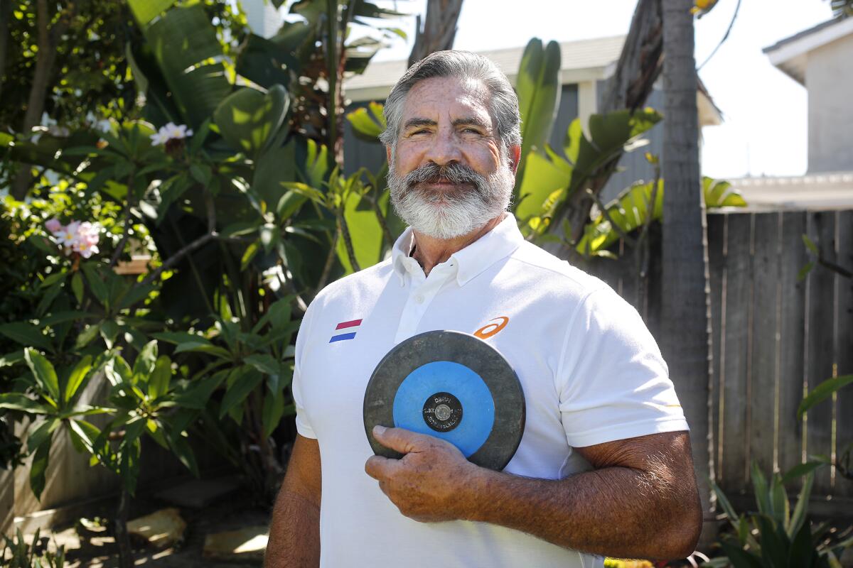 Tony Ciarelli is shown at his home in Huntington Beach. Ciarelli is the longtime throws coach at Newport Harbor High School. 