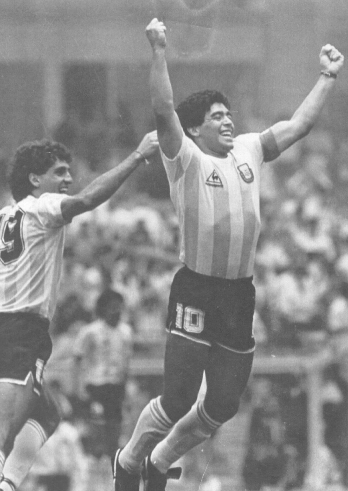 Diego Maradona celebrates after scoring his infamous "hand of God" goal against England in 1986.