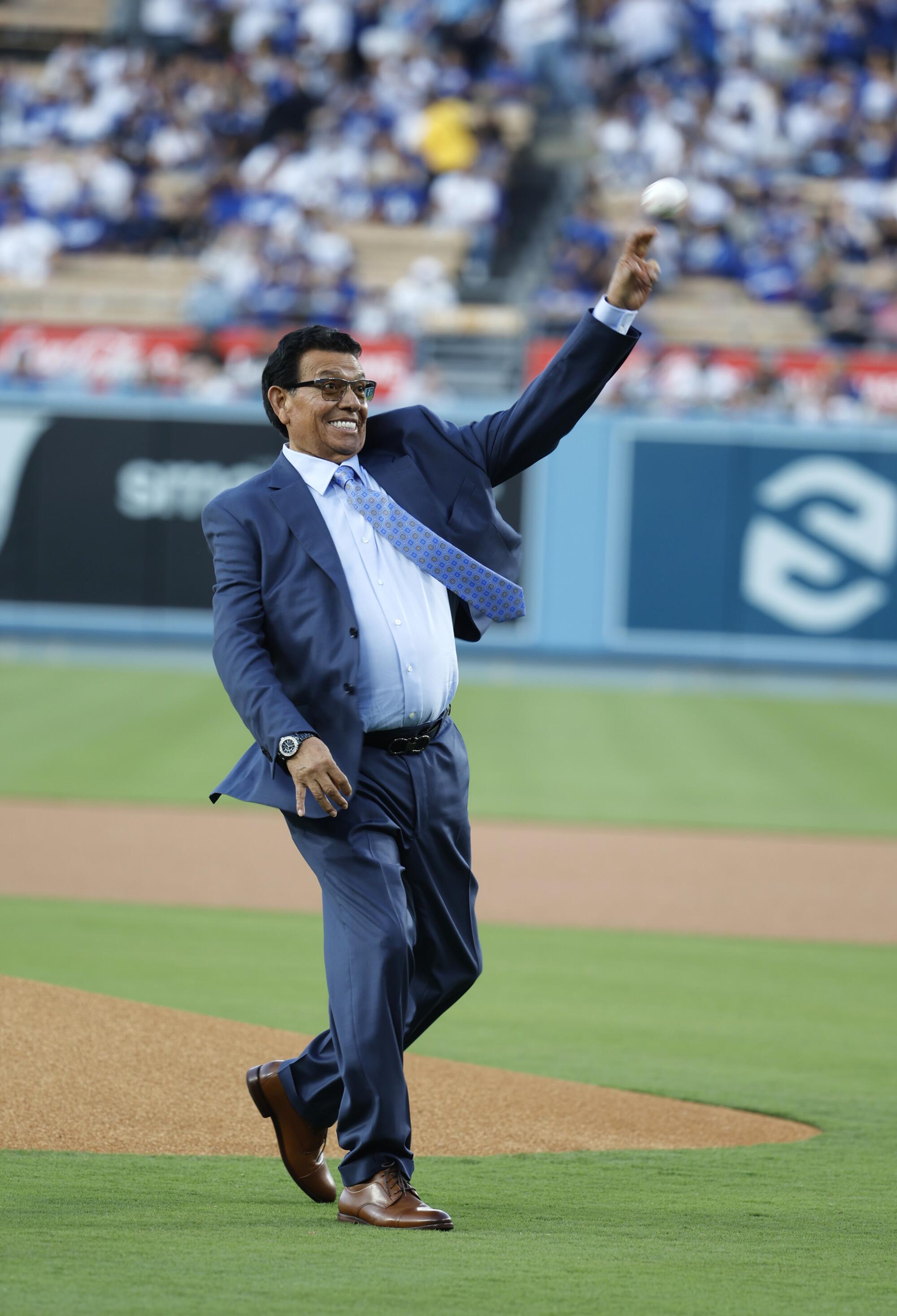 Photographs | Remembering the lifetime of Dodgers legend Fernando Valenzuela 21 Fernando Valenzuela throws ceremonial the first pitch after his jersey number was retired by the Dodgers on August 11, 2023.