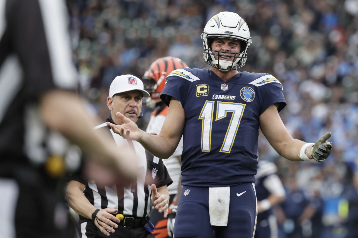 Chargers quarteback Philip Rivers complains to an official after failing to connect with Keenan Allen, arguing that pass interference should’ve been called late in the fourth quarter.