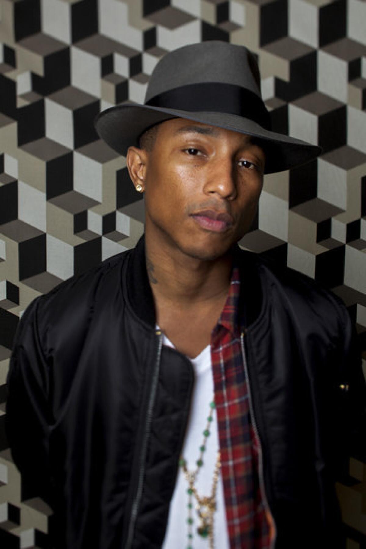 Pharrell Williams Wins Three Grammys & Performs 'Happy' (Video