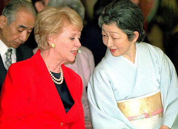 Vigdis Finnbogadottir, first female president of Iceland, chats with Empress Michiko before a concert at the Imperial Palace in Tokyo on April 19, 1996.