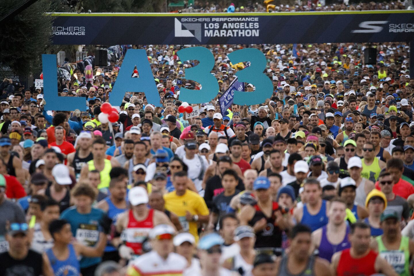 Runners start the L.A. Marathon at Dodger Stadium on March 18.