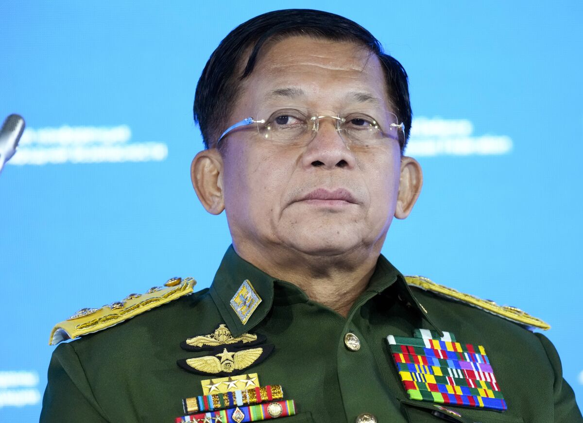 FILE - In this June 23, 2021, file photo, Commander-in-Chief of Myanmar's armed forces, Senior General Min Aung Hlaing delivers his speech at the IX Moscow conference on international security in Moscow, Russia. Six months after seizing power from the elected government, Myanmar’s military leader on Sunday, Aug. 1, 2021, repeated his pledge to hold fresh elections in two years and cooperate with Southeast Asian nations on finding a political solution for his country. (AP Photo/Alexander Zemlianichenko, Pool)