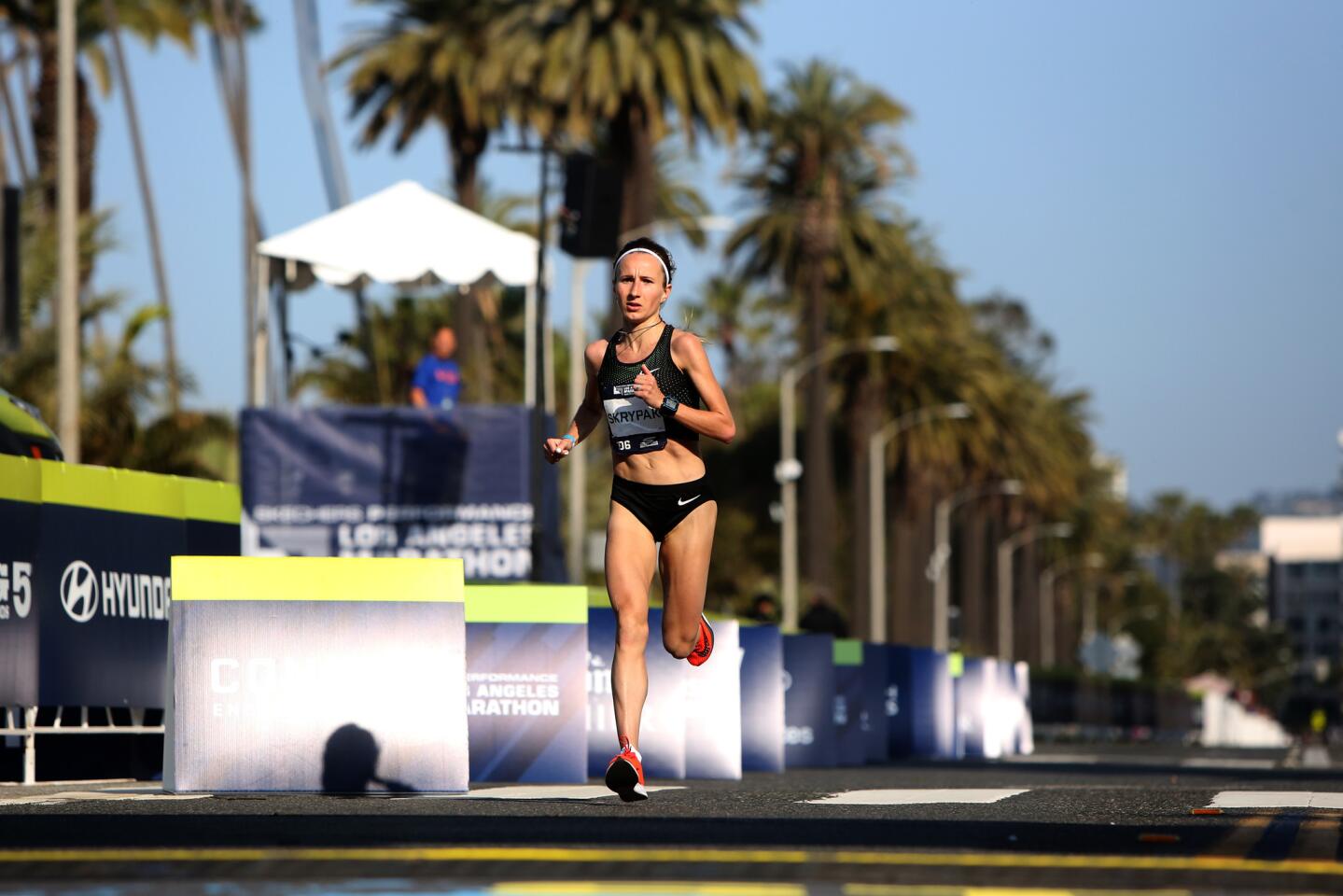 Runner Olha Skrypak finishes in fourth place for female runners during the Los Angeles Marathon on March 24.