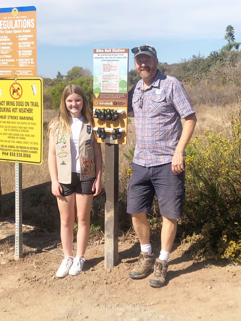 Girl Scout Kendall Crane with Matt Bartelt from the San Diego Mountain Biking Association.