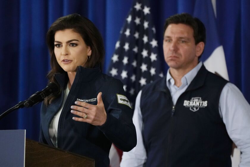 Florida first lady Casey DeSantis speaks as her husband Republican presidential candidate Florida Gov. Ron DeSantis looks on during a campaign event, Wednesday, May 31, 2023, in Cedar Rapids, Iowa. (AP Photo/Charlie Neibergall)