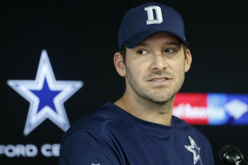 Dallas Cowboys quarterback Tony Romo speaks to the media Tuesday. Romo says Dak Prescott has "earned the right" to take his job as starting quarterback of the team.