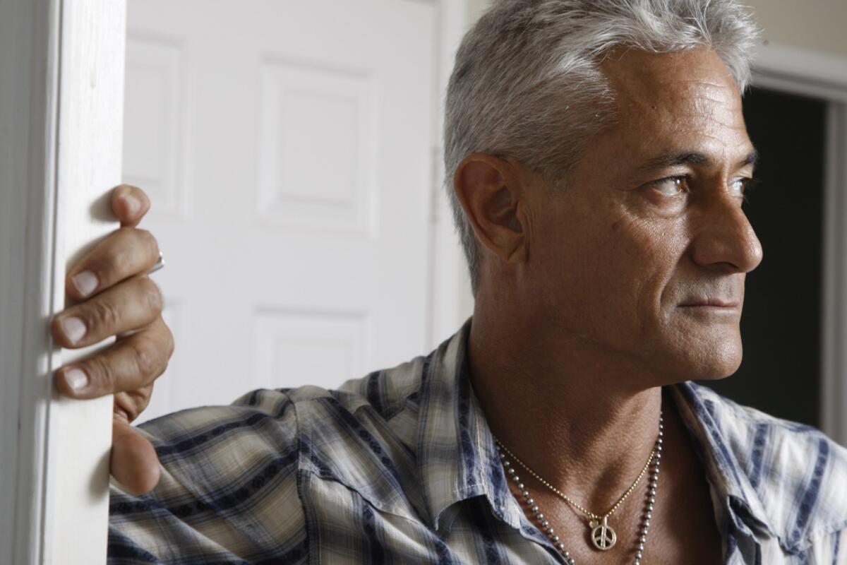 Olympic gold medalist Greg Louganis says his achievements as a world-class diver often feel "like a lifetime ago."