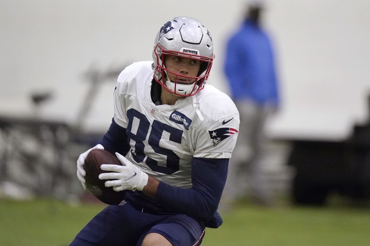 Sports Football Team England Patriots Player With Helmet And Ball