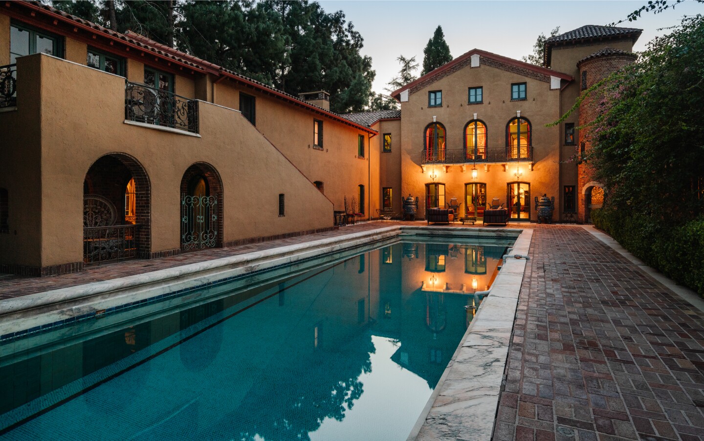 Built in 1923, the 18,000-square-foot mansion once used as a convent is surrounded by gardens, lawns and a trio of guest cottages.