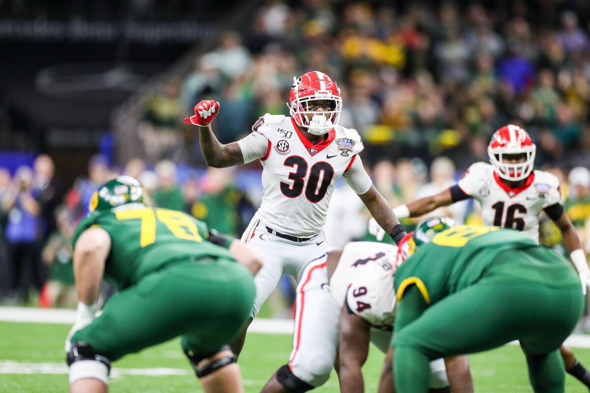 Georgia inside linebacker Tae Crowder (30), seen during the Allstate Sugar Bowl versus Baylor at the Mercedes-Benz Superdome in New Orleans on Jan. 1, was drafted with the final pick by the New York Giants, becoming the 45th Mr. Irrelevant.