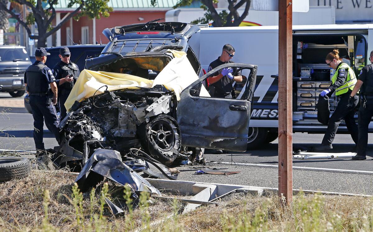 Costa Mesa police investigate a fatal collision Friday near the intersection of Newport Boulevard and17th Street.