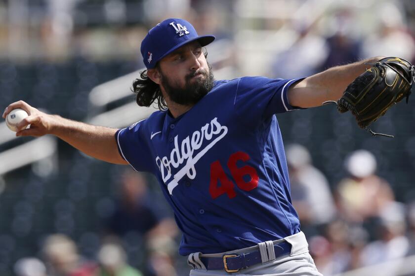 Los Angeles Dodgers starting pitcher Tony Gonsolin throws against the Cleveland Indians during the first inning of a spring training baseball game Thursday, Feb. 27, 2020, in Goodyear, Ariz. (AP Photo/Ross D. Franklin)