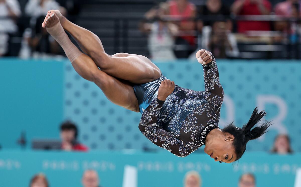 U.S. gymnast Simone Biles competes in the floor exercise during qualifications Sunday.
