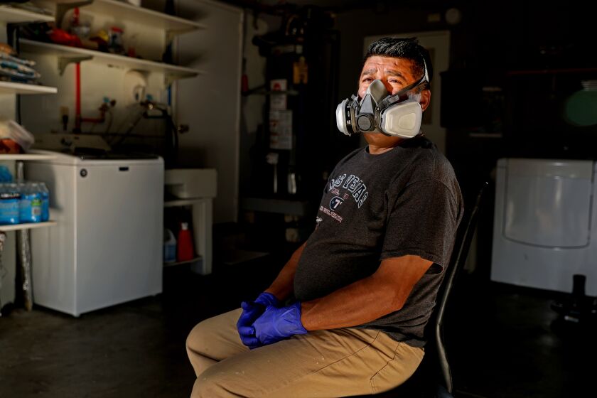 SAN JOSE, CA -- MAY 20: Porfirio, 51, a migrant from Mexico, a diabetic which puts him at higher risk of suffering serious complications and dying from COVID-19, at his home on Wednesday, May 20, 2020, in San Jose, CA. Porfirio is a Bay Area medical maintenance technician earns $27 an hour painting and repairing rooms and hallways in clinics and hospitals, a job that puts him at high risk for catching the coronavirus. (Gary Coronado / Los Angeles Times)