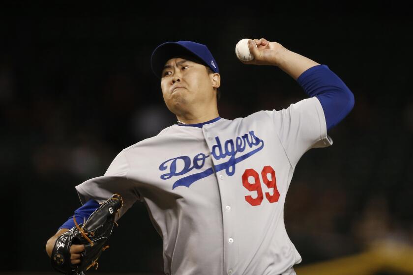 Los Angeles Dodgers starting pitcher Hyun-Jin Ryu, of South Korea, throws a pitch to an Arizona Diamondbacks batter during the first inning of a baseball game Thursday, Aug. 29, 2019, in Phoenix. (AP Photo/Ross D. Franklin)