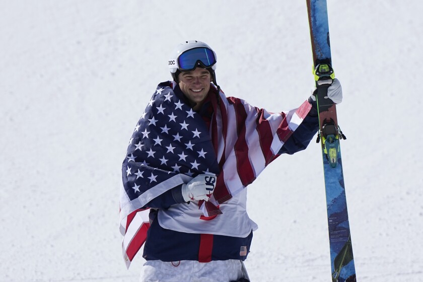 Silver medal winner United State's Nick Goepper celebrates during the venue award ceremony for the men's slopestyle finals at the 2022 Winter Olympics, Wednesday, Feb. 16, 2022, in Zhangjiakou, China. (AP Photo/Gregory Bull)
