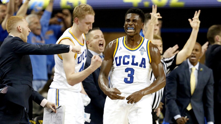 UCLA guard Aaron Holiday (3) reacts after making a three-point shot against Oregon to give the Bruins their first lead Thursday night.