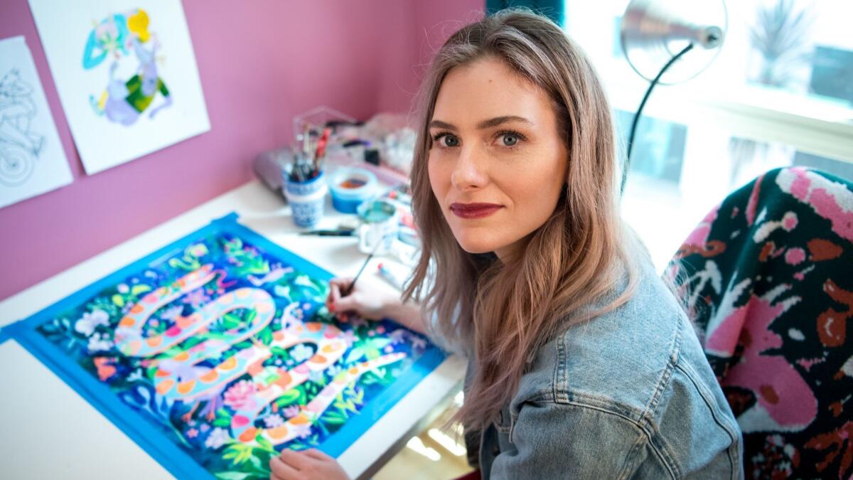 Cartoonist and TV producer Lisa Hanawalt paints in her studio. Hanawalt's drawings established the look of Netflix's hit "BoJack Horseman" and are at the center of "Tuca & Bertie," a new adult animated series debuting Friday.