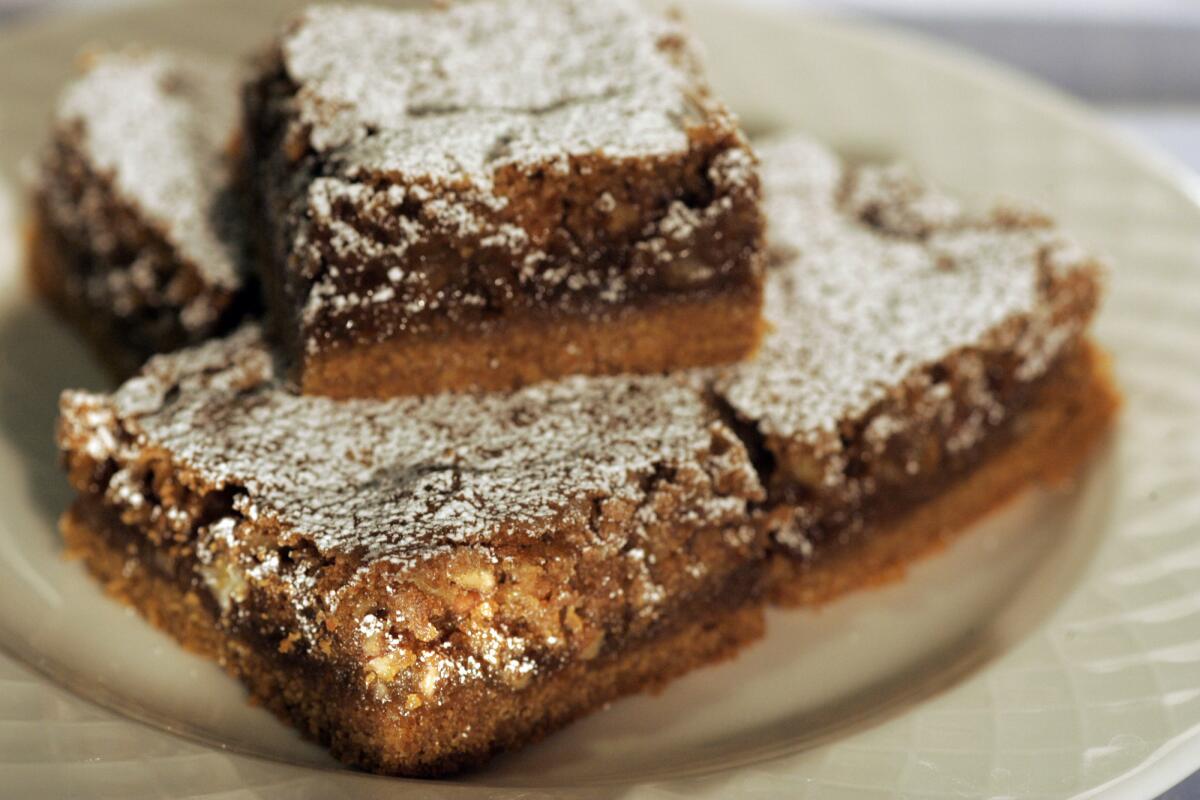 Each bar is like a perfect miniature pecan pie baked over a wonderfully crumbly graham cracker crust.