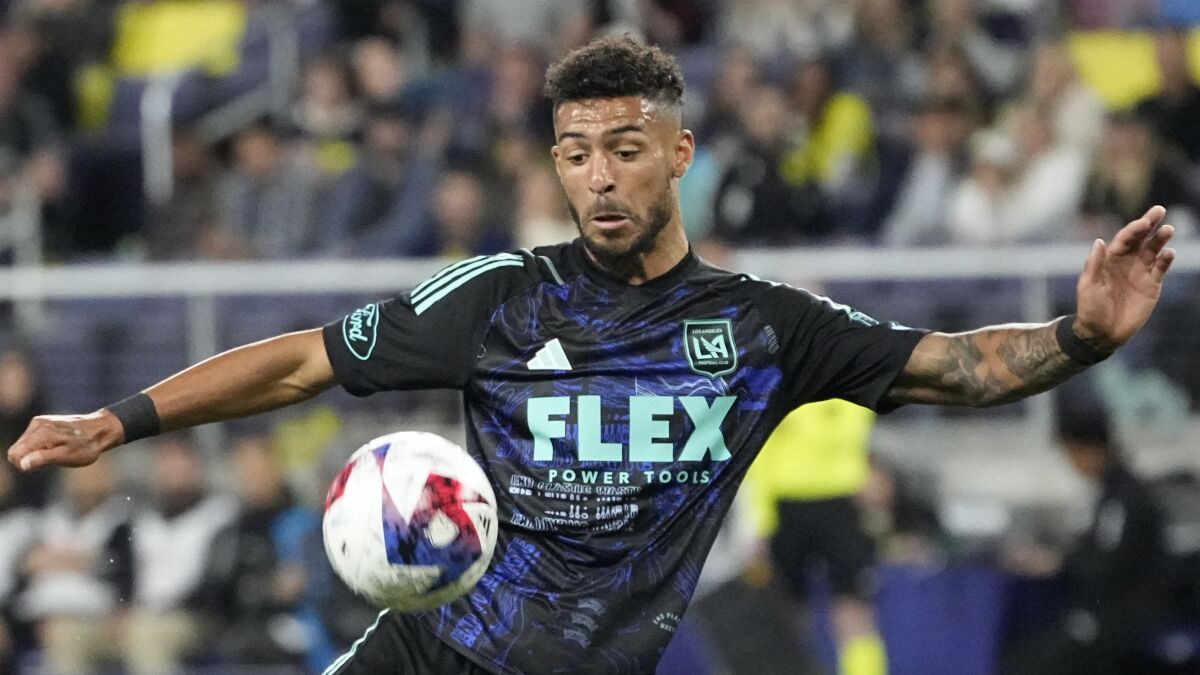 LAFC forward Denis Bouanga moves the ball during the second half against Nashville SC.