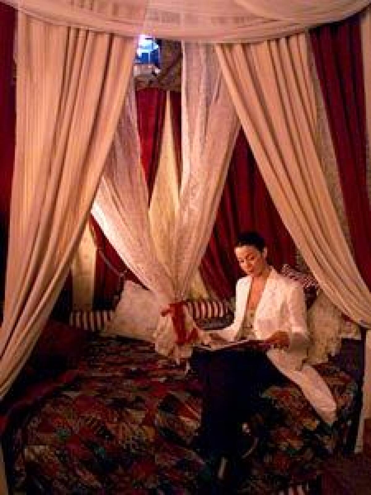 Actress Claudia Christian's remodeled basement has a Moroccan bed where guests often relax and socialize.