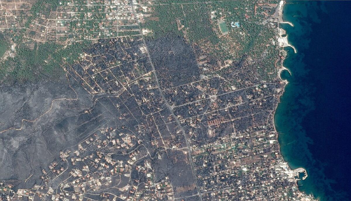 An aerial photo released July 27, 2018, shows the devastation wrought by the wildfire in and around Mati.