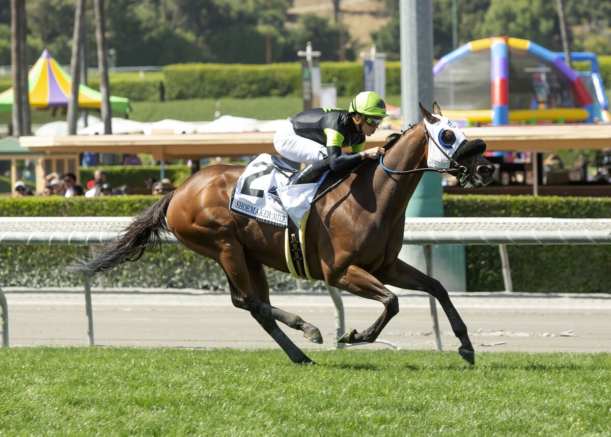 Jockey Irad Ortiz Jr. rides Count Again to victory in the Grade I, $500,000 Shoemaker Mile at Santa Anita Park.
