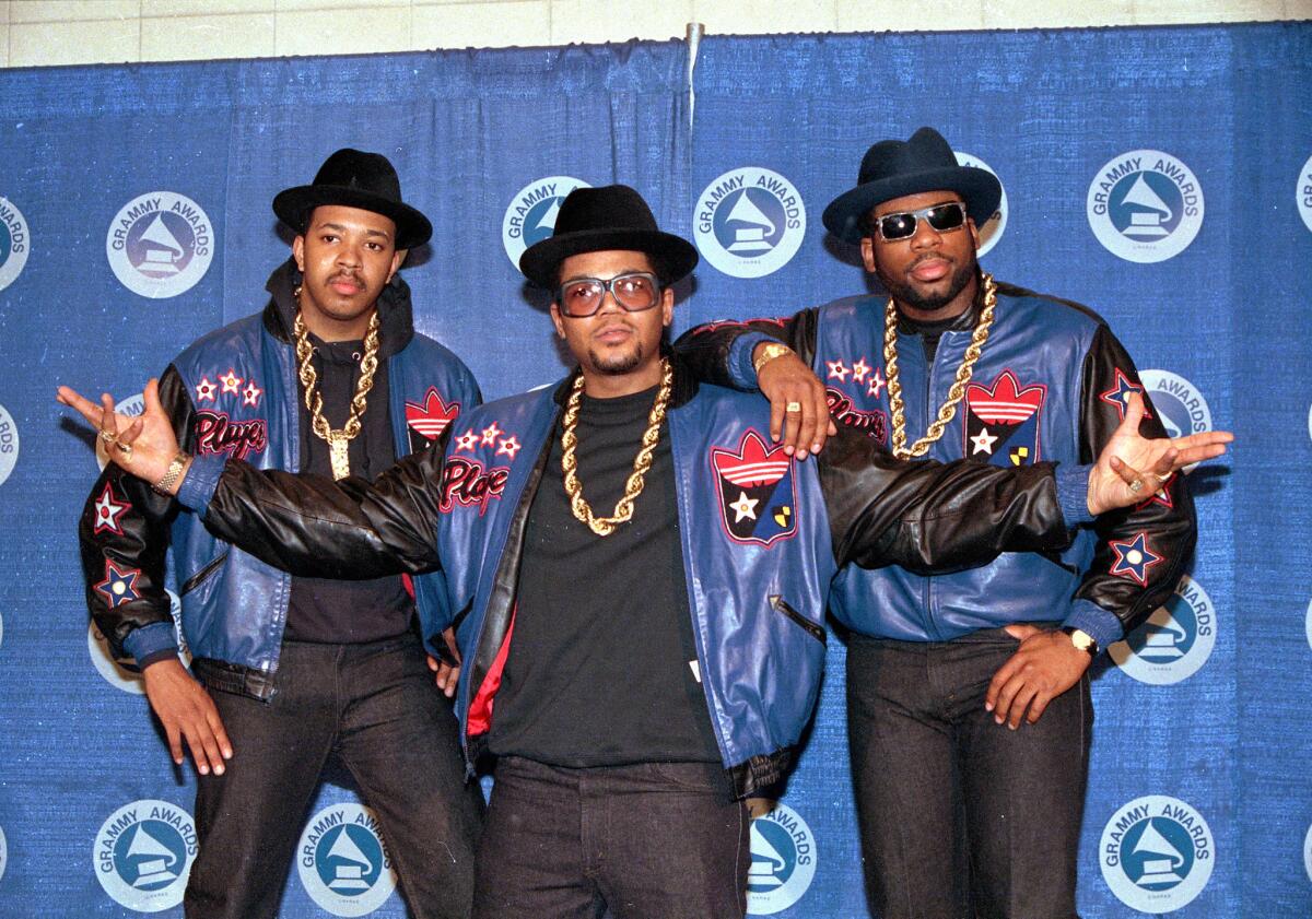 Run DMC (from left, Joseph "Run" Simmons, Darryl "DMC" McDaniels, and Jason Mizell "Jam Master Jay") pose at the 31st annual Grammy Awards in New York City on March 2, 1988.