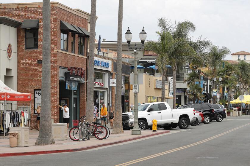Main Street in downtown Huntington Beach on Thursday. In 2021, the city initiated the Downtown Huntington Beach Urban Design Study, and is conducting a "Downtown Dreamin'" community engagement sessions about what downtown means to them.