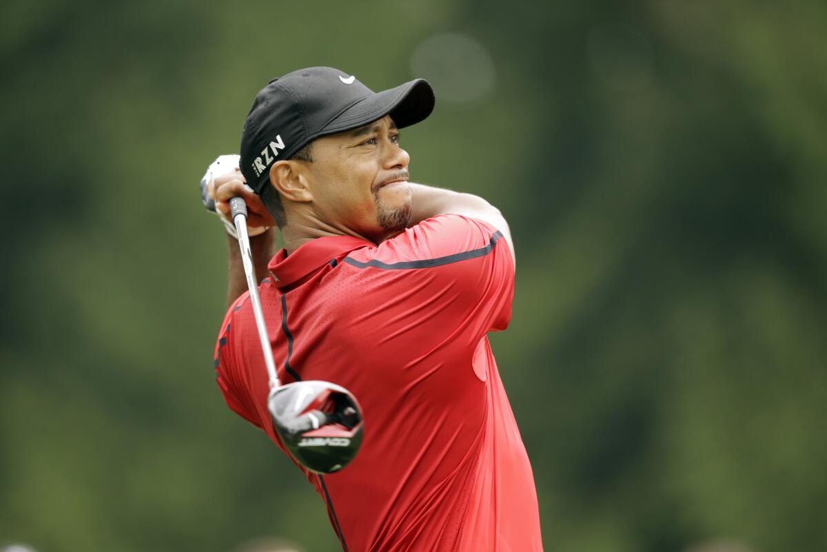 Tiger Woods reinjured his back on Sunday.