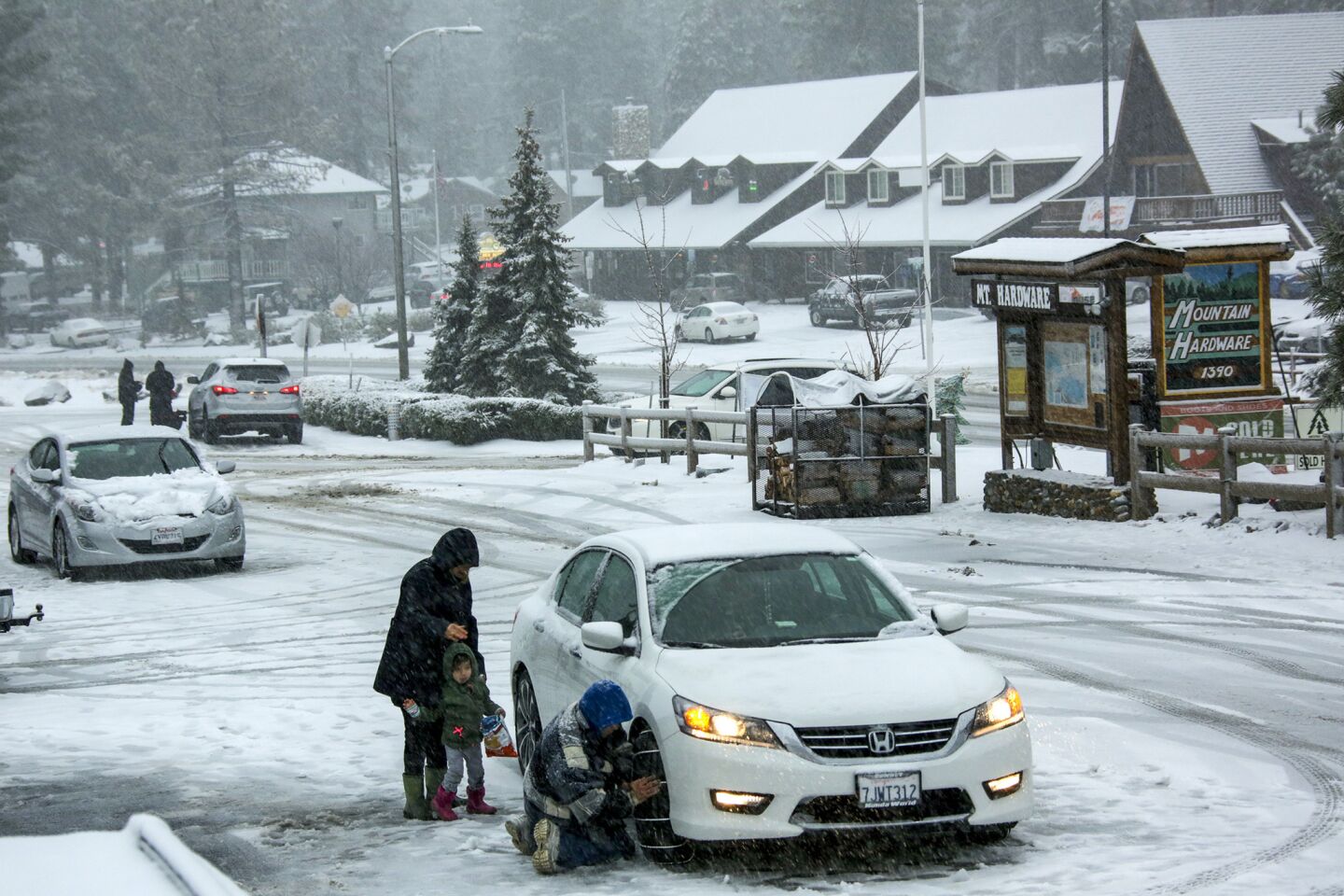 Due to heavy snow fall people visiting Wrightwood are required put on snow chains on their vehicles.
