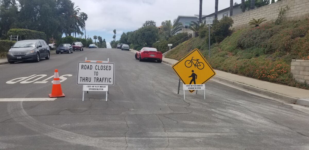 As part of the city of San Diego's "slow streets" program, Diamond Street in Pacific Beach is closed to through traffic between Mission Boulevard and Olney Street in an effort to create a safe path for pedestrians and bicyclists.