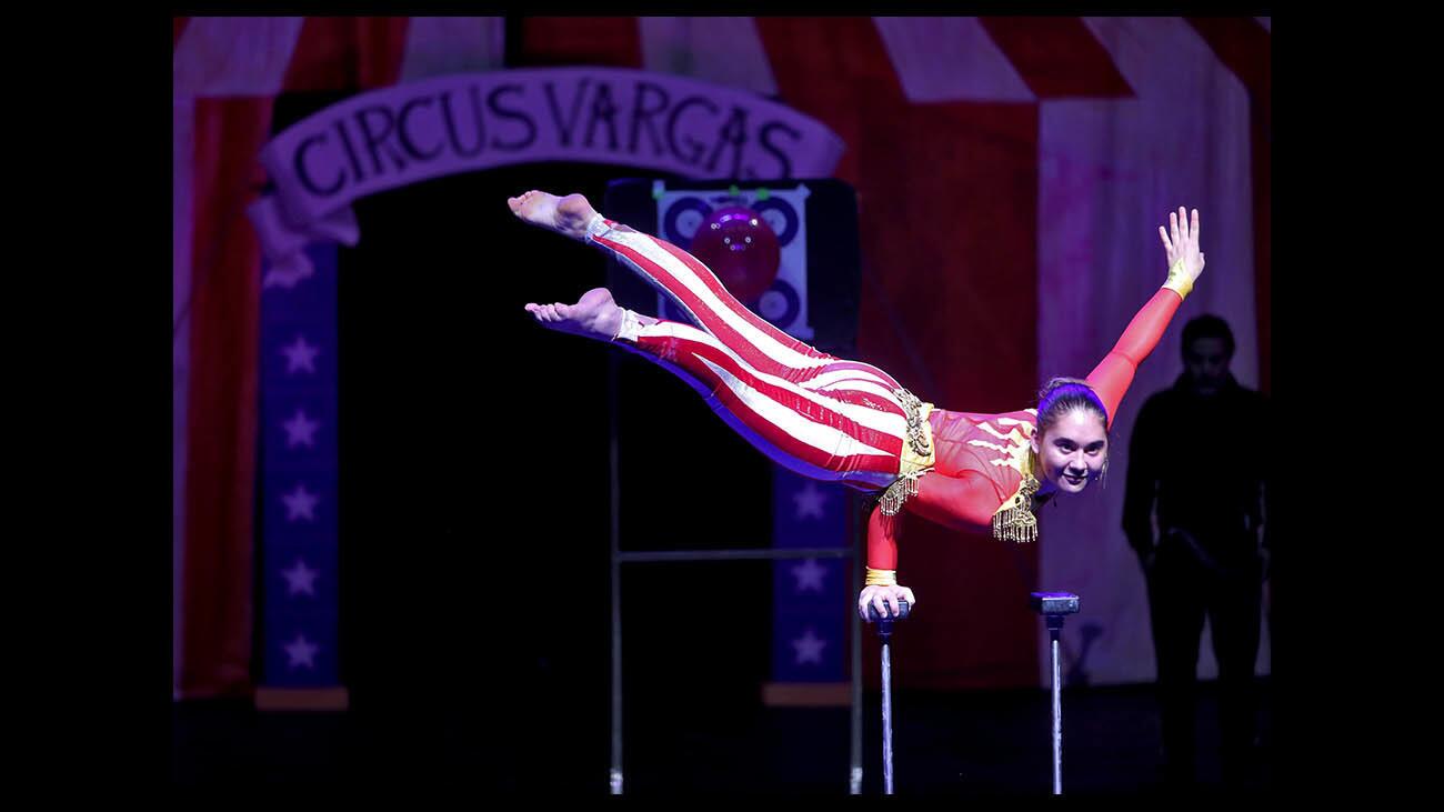 Contortionist Daniella Quiroga balances on one hand during practice before the opening of Circus Vargas, at 777 N. Front St, in Burbank on Tuesday, Jan. 15, 2019.