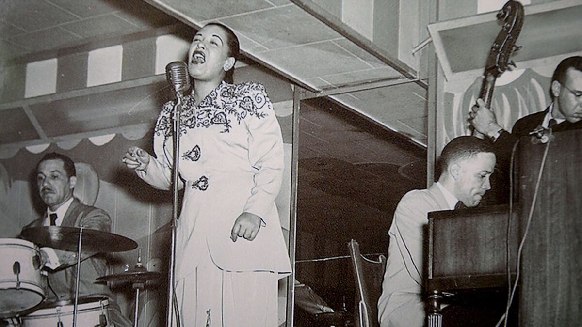Billie Holiday, seen here in a photograph hanging at the Dunbar Hotel in South Los Angeles, is among the musicians whose master recordings were destroyed in a 2008 fire at Universal Studios Hollywood, a loss long hidden from public knowledge.