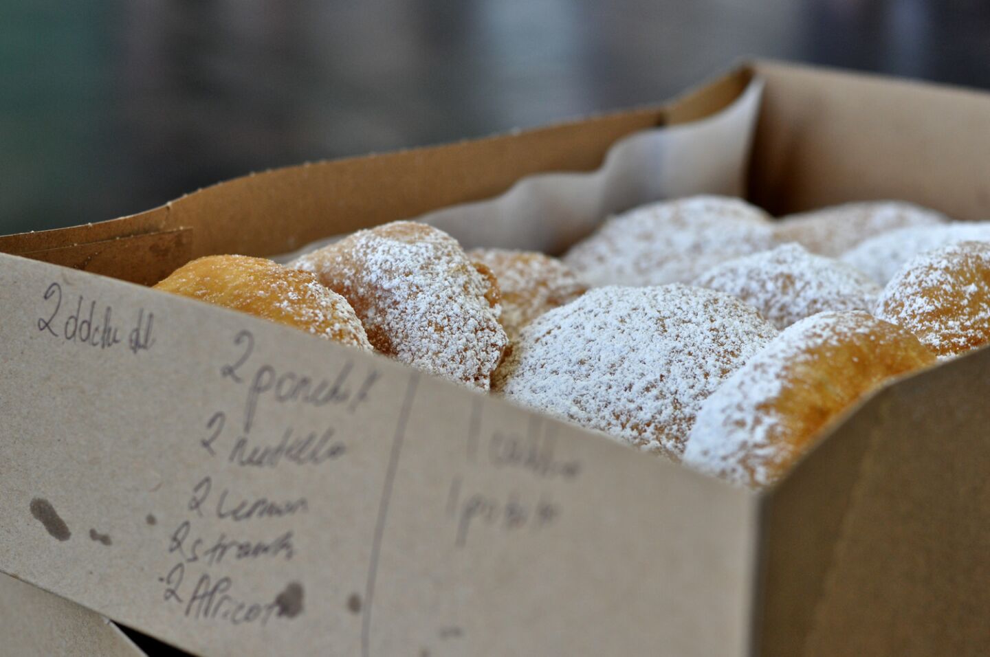 A dozen ponchiks, or Armenian doughnuts, at Papillon International Bakery in Glendale.
