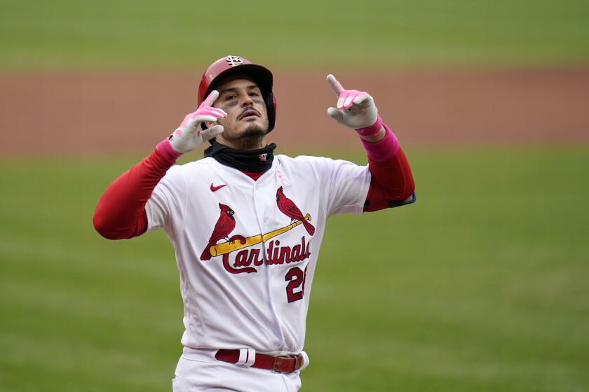 St. Louis Cardinals' Nolan Arenado celebrates after hitting a solo home run during the second inning of a baseball game against the Colorado Rockies Sunday, May 9, 2021, in St. Louis. (AP Photo/Jeff Roberson)