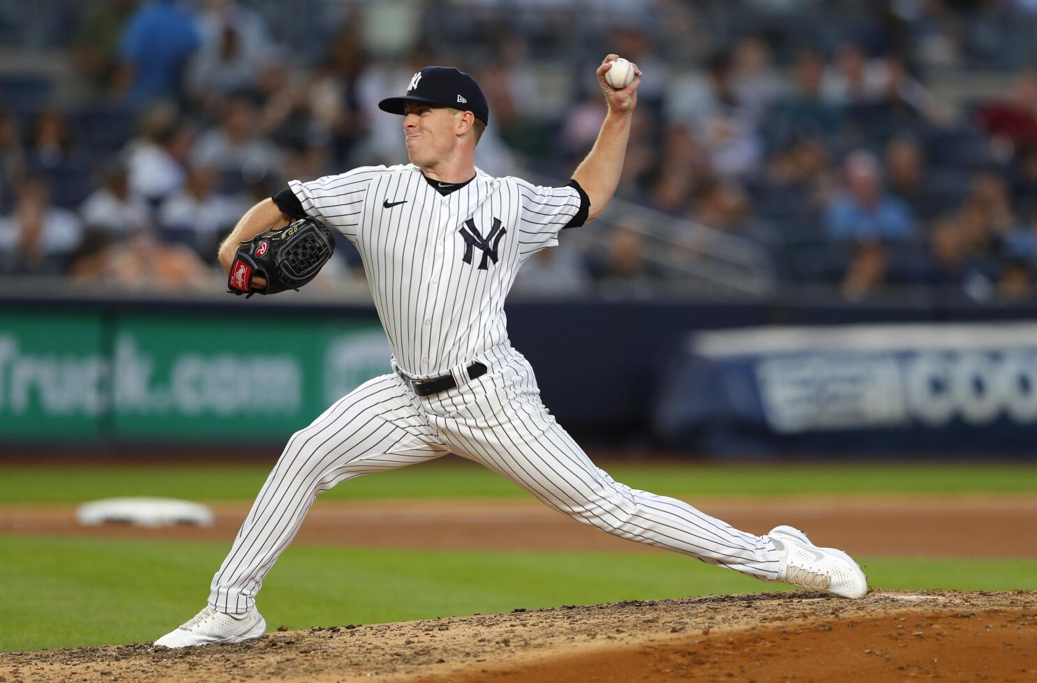 Sears pitches major league-best Yankees past lowly A's 2-1 - The