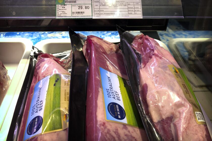 Packages of beef imported from Australia are on sale at a supermarket in Beijing, Friday, May 15, 2020. China has too much at stake to destroy its trading relationship with Australia entirely but is using sanctions to send a sharp warning to the South Pacific nation about its calls for a robust coronavirus inquiry, an expert says. China has suspended beef imports from four Australian slaughterhouses and is threatening to impose huge tariffs on barley after Australia called for independent inquiry into the origins of the virus. (AP Photo/Mark Schiefelbein)