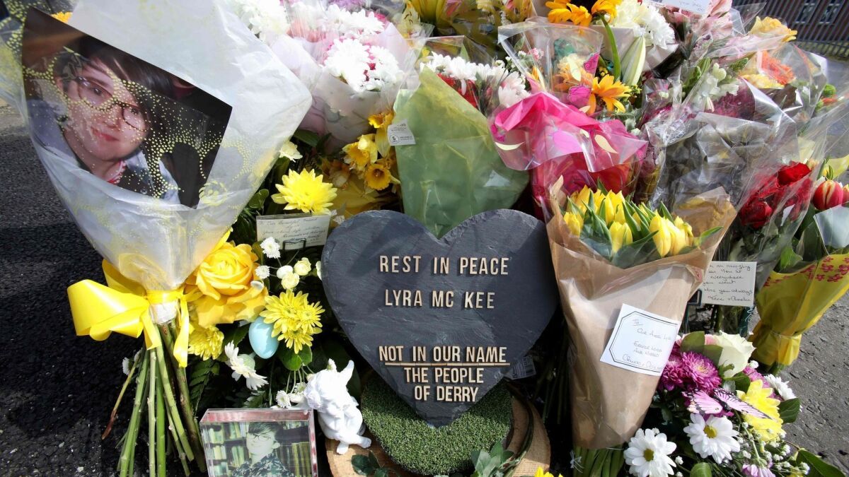 Floral tributes to journalist Lyra McKee at the site of her shooting death.