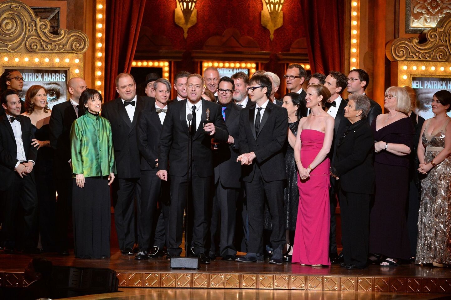 Producer David Binder accepts the award for best revival of a musical with the cast of "Hedwig and the Angry Inch."